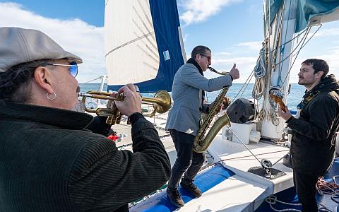 Sailing on the catamaran with live music